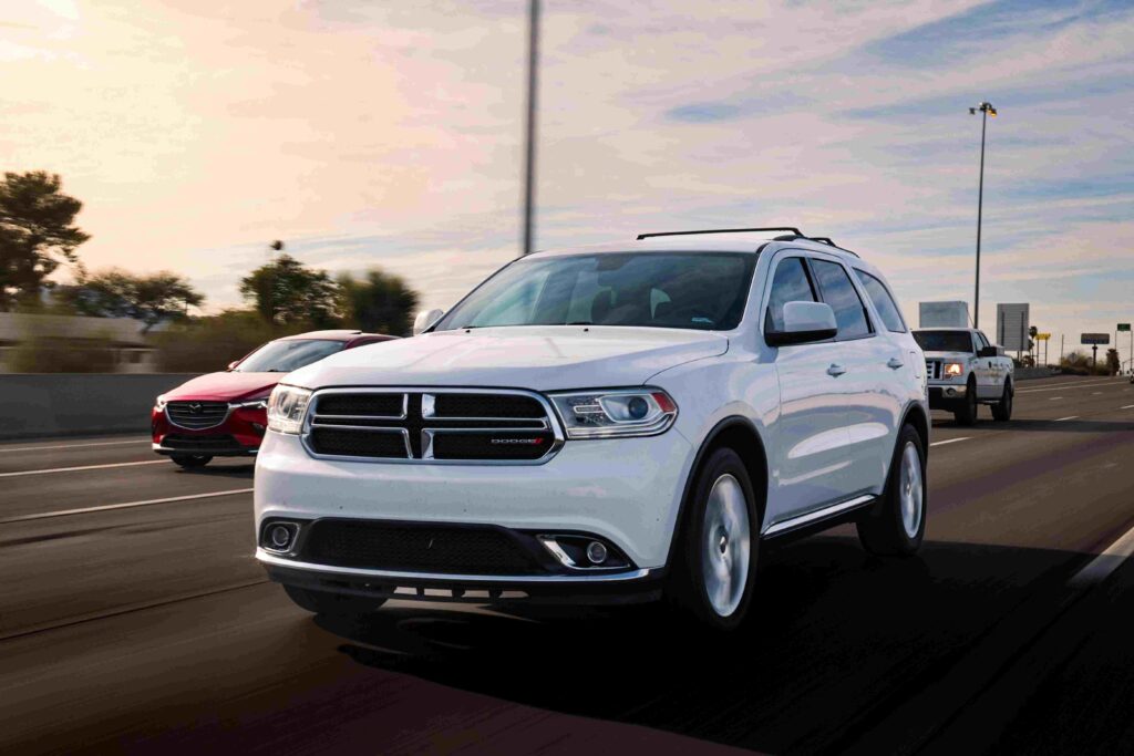 A Dodge Durango drives down a highway.