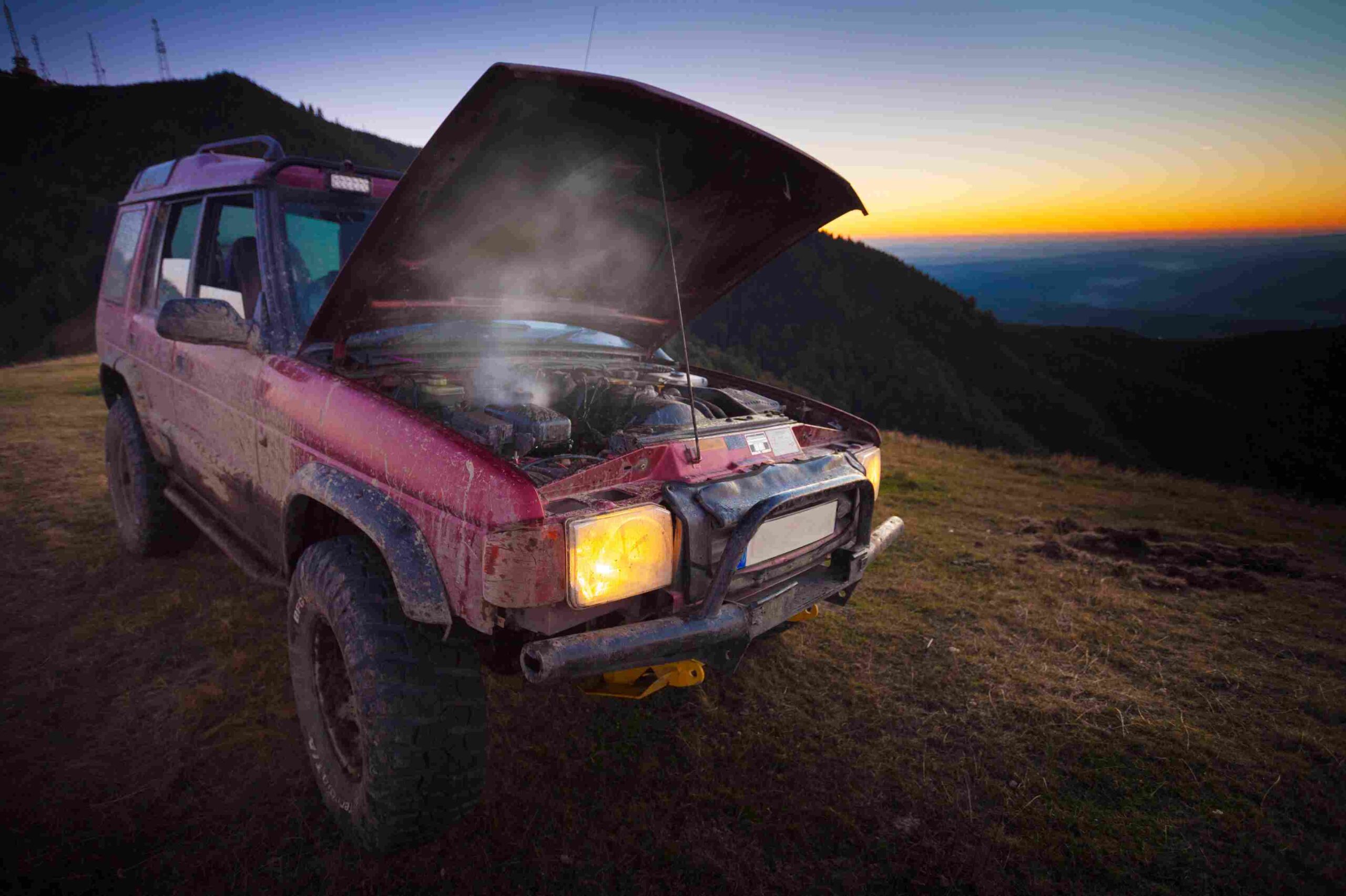 A car broken down in a remote area.